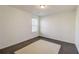 Bright bedroom with hardwood floors, natural light, and neutral wall color at 1761 Stoney Chase Dr, Lawrenceville, GA 30044