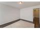 Empty bedroom with hardwood floors and natural light at 1761 Stoney Chase Dr, Lawrenceville, GA 30044