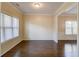 Bright dining room with hardwood floors, and natural light streaming through the windows at 1761 Stoney Chase Dr, Lawrenceville, GA 30044