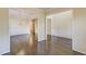 Open concept living space with hardwood floors, wainscoting, and lots of natural light at 1761 Stoney Chase Dr, Lawrenceville, GA 30044