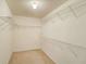Spacious walk-in closet with wire shelving providing ample storage space at 1761 Stoney Chase Dr, Lawrenceville, GA 30044