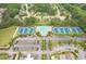 Beautiful aerial view showcasing the pool and tennis courts amenities within a neighborhood surrounded by lush trees and manicured grounds at 285 Turtle Rock Pl, Acworth, GA 30101