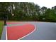 Community basketball court surrounded by trees, perfect for outdoor recreation and sports at 285 Turtle Rock Pl, Acworth, GA 30101