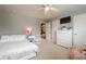 Comfortable bedroom with soft gray walls, a ceiling fan and ample storage space with a dresser at 285 Turtle Rock Pl, Acworth, GA 30101