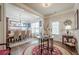 Elegant dining room featuring hardwood floors, wainscoting, and stylish decor at 285 Turtle Rock Pl, Acworth, GA 30101