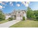 Charming two-story home with a brick facade, landscaped yard, and attached two-car garage at 285 Turtle Rock Pl, Acworth, GA 30101