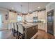 Kitchen features stainless appliances, granite countertops, center island, and eat-in breakfast area at 285 Turtle Rock Pl, Acworth, GA 30101