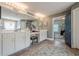 Bright main bathroom featuring double sinks with white cabinets and a separate makeup vanity at 285 Turtle Rock Pl, Acworth, GA 30101