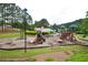 Community playground with slides and play equipment for outdoor fun at 285 Turtle Rock Pl, Acworth, GA 30101