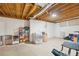 Unfinished basement with laundry area and storage at 3780 Bays Ferry Way, Marietta, GA 30062