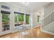Breakfast nook with views of the wood deck and lush backyard landscaping at 3780 Bays Ferry Way, Marietta, GA 30062