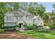 Charming two-story home features a well-manicured lawn and beautiful landscaping at 3780 Bays Ferry Way, Marietta, GA 30062