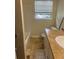 Bathroom with a tile floor, tub/shower and sink at 4701 Flat Shoals Rd # 65A, Union City, GA 30291