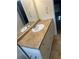 Bathroom vanity with white cabinetry and a brown countertop at 4701 Flat Shoals Rd # 65A, Union City, GA 30291