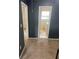 Bedroom view into adjoining bathroom and hallway at 4701 Flat Shoals Rd # 65A, Union City, GA 30291