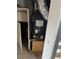 HVAC unit behind a white paneled door and next to water heater closet at 4701 Flat Shoals Rd # 65A, Union City, GA 30291