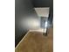 View from the top of the staircase looking down towards a window at 4701 Flat Shoals Rd # 65A, Union City, GA 30291