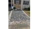Home exterior featuring decorative rock landscaping around the front of the house at 4701 Flat Shoals Rd # 65A, Union City, GA 30291