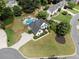 A scenic aerial view of a home's yard with a large, inviting pool and landscaping at 503 Chatfield Nw Way, Marietta, GA 30064