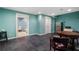 Finished basement features a mini fridge, table and chairs, and tile flooring at 503 Chatfield Nw Way, Marietta, GA 30064