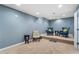 Finished basement features cozy seating, carpeted floors, and recessed lighting at 503 Chatfield Nw Way, Marietta, GA 30064