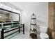 Modern bathroom with double sinks, glass countertops, and a glass-enclosed shower at 503 Chatfield Nw Way, Marietta, GA 30064