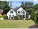 Elegant home featuring manicured landscaping, expansive lawn, and a classic facade at 503 Chatfield Nw Way, Marietta, GA 30064