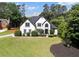 Stunning two-story home with an arched entryway and well-manicured lawn at 503 Chatfield Nw Way, Marietta, GA 30064