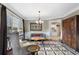 Cozy living room showcasing a bay window, stylish furnishings, and an open view to the adjacent kitchen at 503 Chatfield Nw Way, Marietta, GA 30064