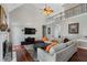 Comfortable living room featuring high ceilings, with fireplace, and hardwood flooring at 503 Chatfield Nw Way, Marietta, GA 30064