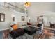 Cozy living room with high ceilings, balcony and brick fireplace below television at 503 Chatfield Nw Way, Marietta, GA 30064