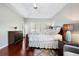 Spacious bedroom with hardwood floors, ceiling fan, and natural light at 503 Chatfield Nw Way, Marietta, GA 30064