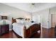 Spacious bedroom with hardwood floors, ceiling fan, and natural light at 503 Chatfield Nw Way, Marietta, GA 30064