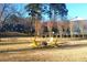 Shared community firepit and picnic table offer residents a comfortable outdoor gathering and dining space at 3137 Buford Ne Hwy # 11, Brookhaven, GA 30329