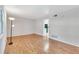 Inviting living room with hardwood floors and a bright view into the kitchen area at 3137 Buford Ne Hwy # 11, Brookhaven, GA 30329