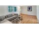 Inviting living room with hardwood floors, natural light and a stylish seating arrangement at 3137 Buford Ne Hwy # 11, Brookhaven, GA 30329