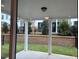 The covered patio overlooks a well maintained and landscaped backyard with privacy fencing at 707 Dodd N Ln # 164, Buford, GA 30518
