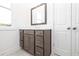 Bathroom vanity with quartz countertop and ample storage at 707 Dodd N Ln # 164, Buford, GA 30518