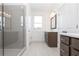 Contemporary bathroom with glass shower and sleek dark wood vanity at 707 Dodd N Ln # 164, Buford, GA 30518