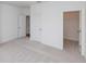 Spacious bedroom features neutral carpet, a walk-in closet, and a bright, airy feel with plenty of natural light at 707 Dodd N Ln # 164, Buford, GA 30518