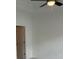 Bedroom with a ceiling fan and neutral color scheme at 707 Dodd N Ln # 164, Buford, GA 30518