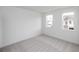Bright and airy bedroom with plenty of natural light from dual windows at 707 Dodd N Ln # 164, Buford, GA 30518