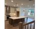 Modern kitchen with a large island, stainless steel appliances, and pendant lighting at 707 Dodd N Ln # 164, Buford, GA 30518