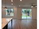 Bright living area with access to the backyard patio, featuring an abundance of natural light at 707 Dodd N Ln # 164, Buford, GA 30518