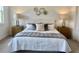 Stylishly decorated main bedroom featuring modern decor and bedside lamps at 707 Dodd N Ln # 164, Buford, GA 30518