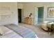 Serene main bedroom with seating area and ensuite bathroom at 707 Dodd N Ln # 164, Buford, GA 30518