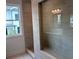 Modern shower with a large glass enclosure and tiled walls at 707 Dodd N Ln # 164, Buford, GA 30518