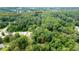 Aerial view shows the property's location near the Silver Comet Trail and wooded surroundings at 789 Concord Sw Rd, Smyrna, GA 30082