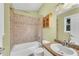 Bathroom featuring a shower-tub combination and a granite vanity at 789 Concord Sw Rd, Smyrna, GA 30082