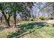 Lush backyard featuring mature trees and ample space for recreation at 141 Nathan Rd, Atlanta, GA 30331